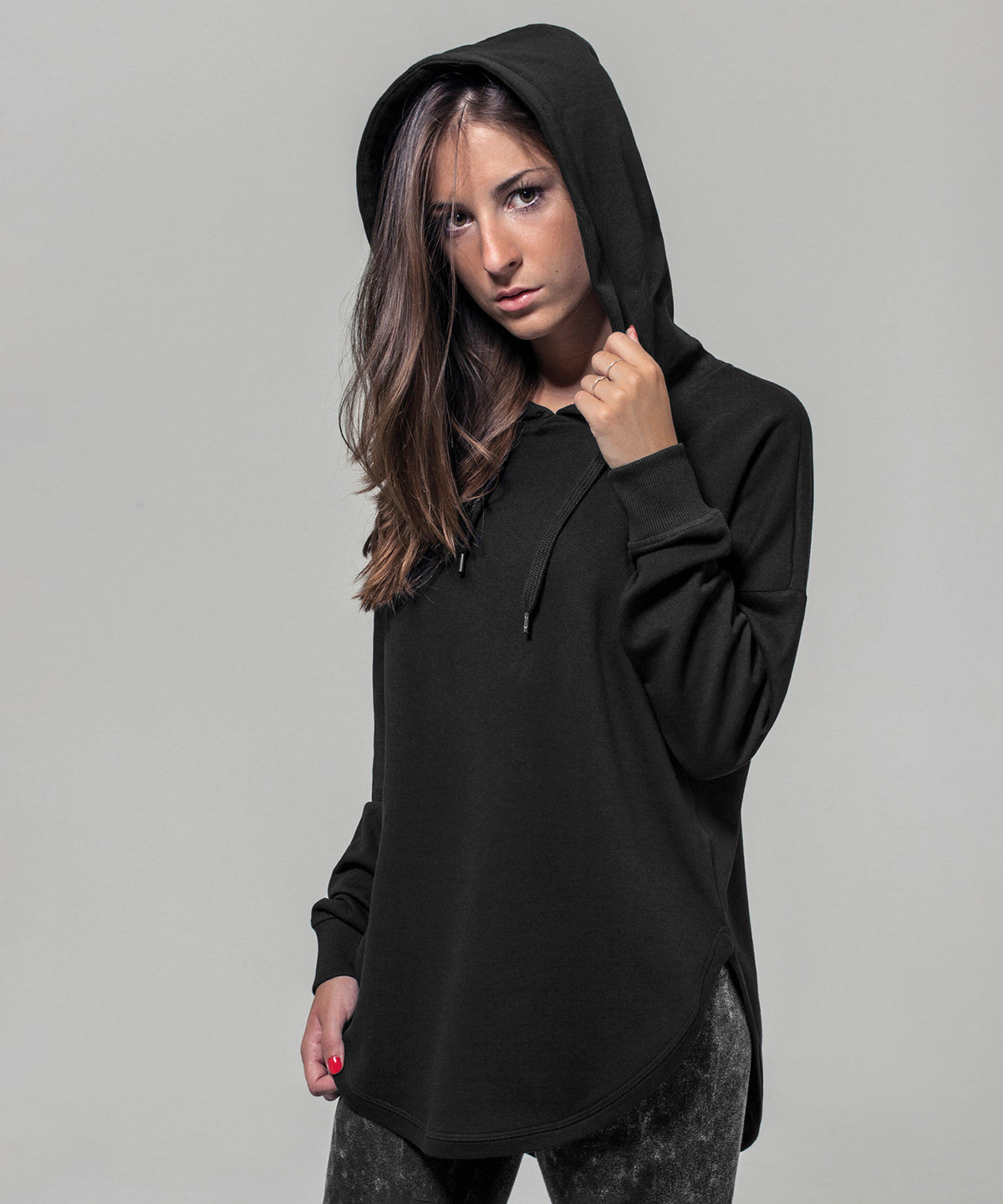 Build Your Brand Women's oversized hoodie, lifestyle photo
