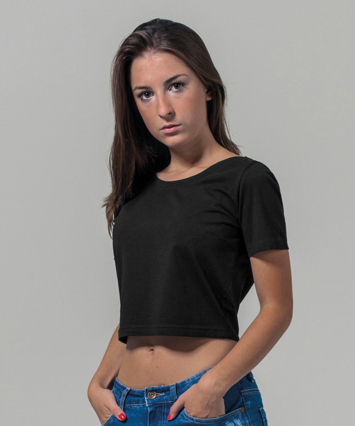 Build Your Brand Women's cropped tee, lifestyle photo