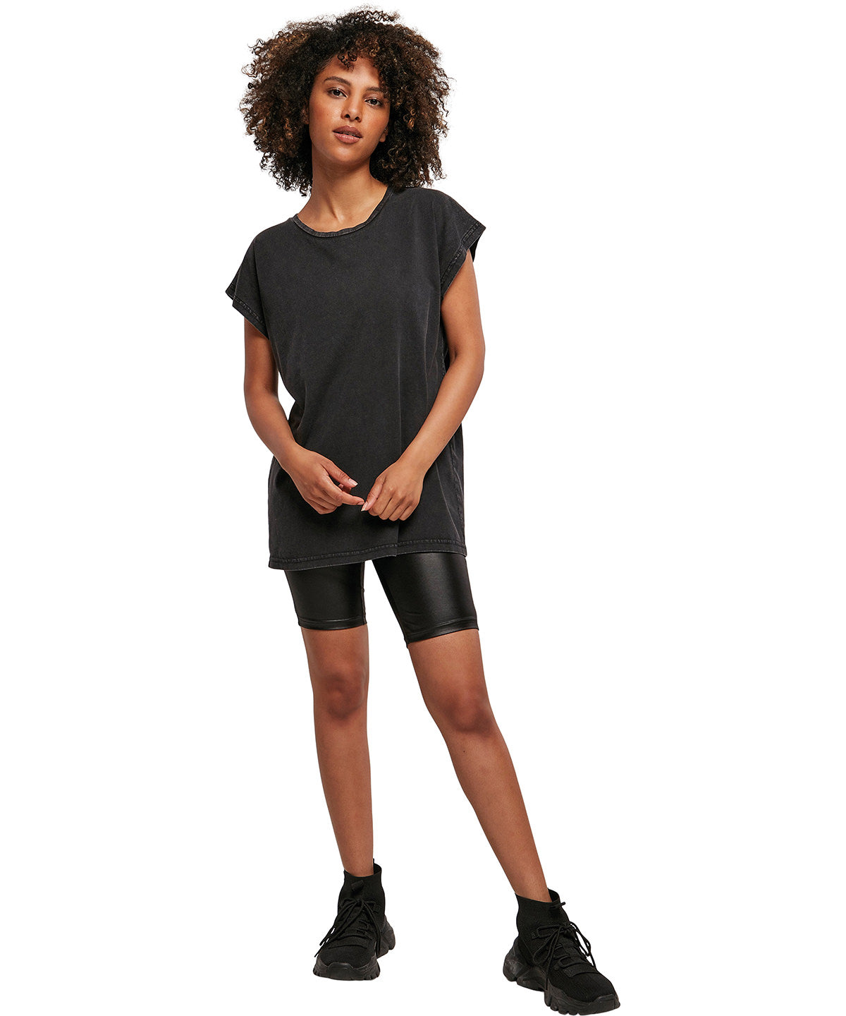 Build Your Brand Women's acid washed extended shoulder tee, lifestyle photo