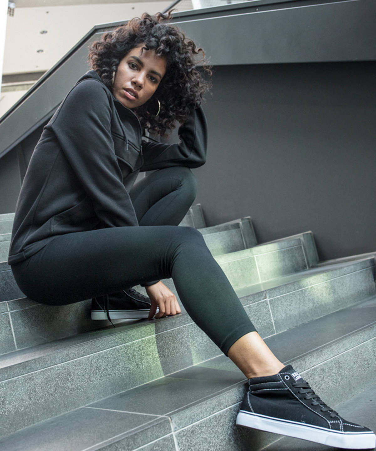 Build Your Brand Women's stretch Jersey leggings in Black, lifestyle photo