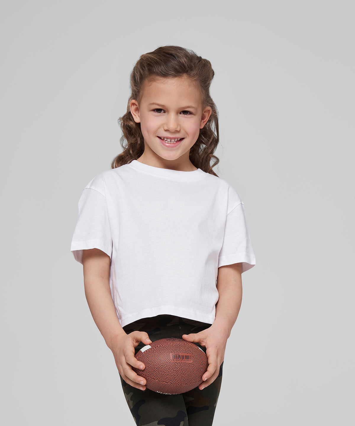 Build Your Brand Girls cropped Jersey tee, lifestyle photo