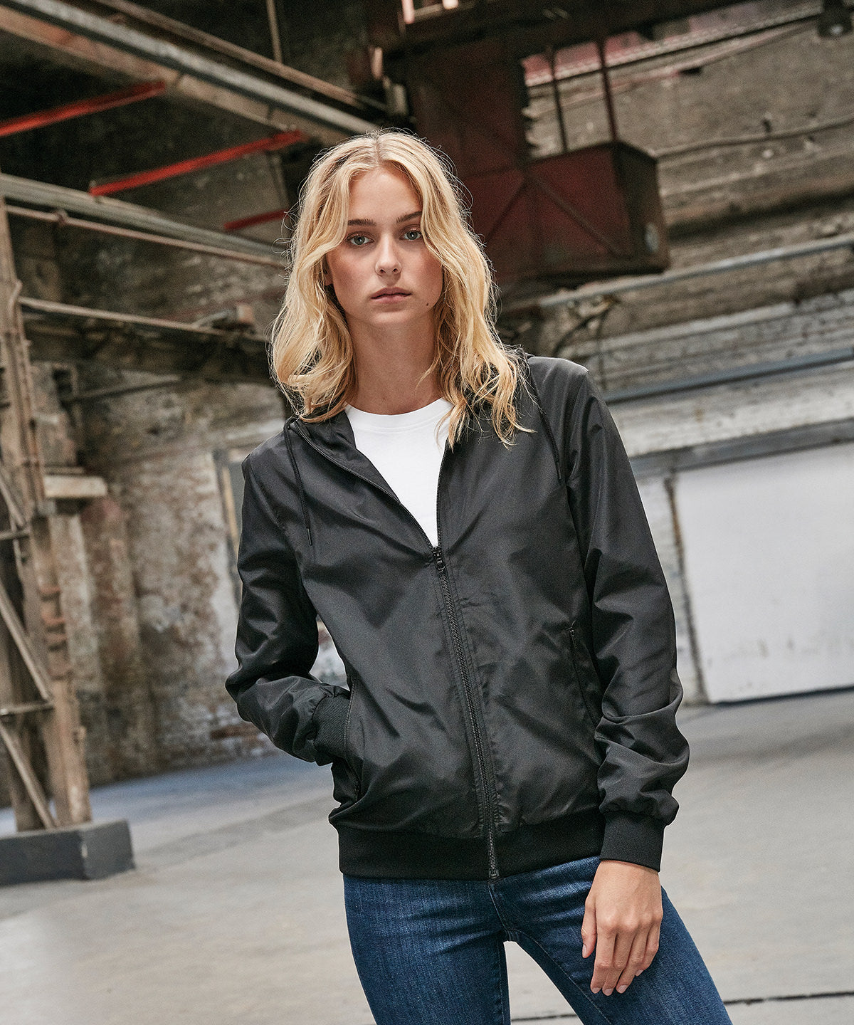 Build Your Brand Women's recycled windrunner, lifestyle photo