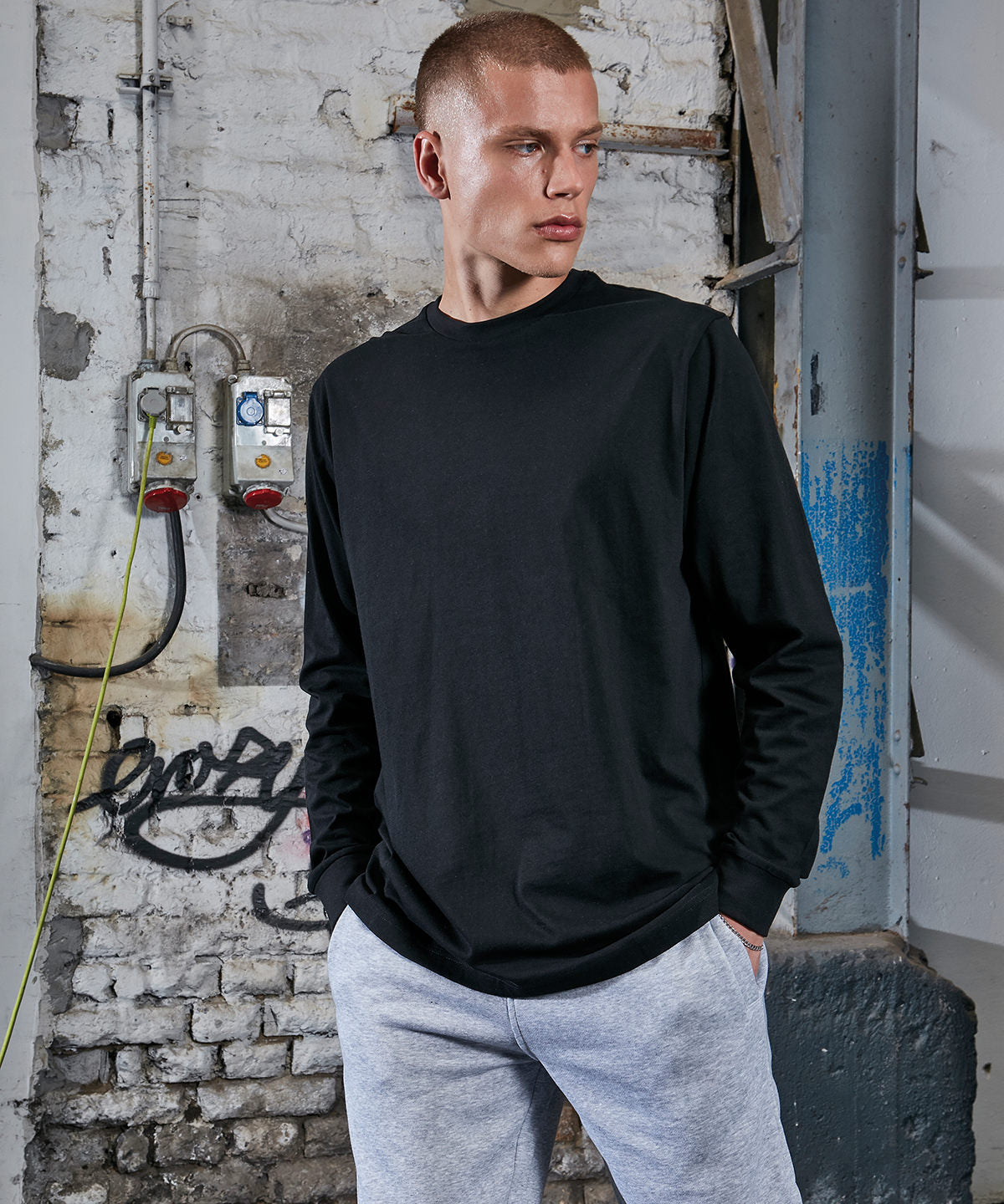Build Your Brand Organic long sleeve with cuff rib in Black, lifestyle photo