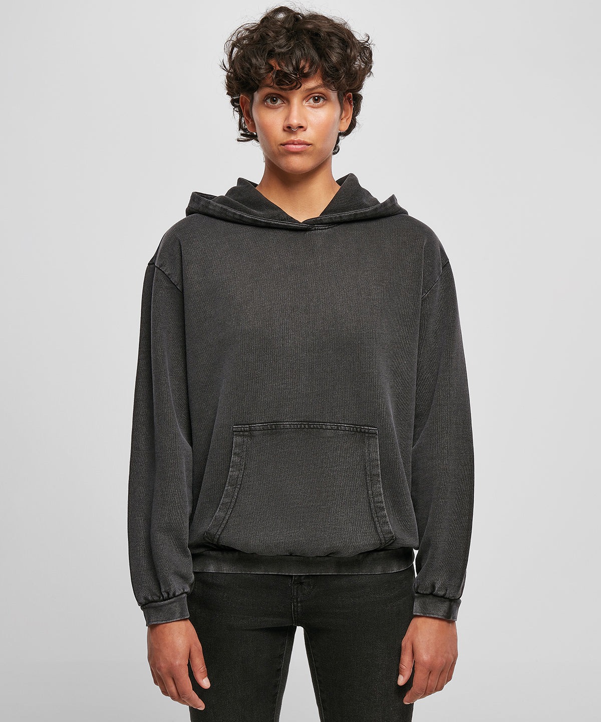 Build Your Brand Women's acid washed oversized hoodie, lifestyle photo
