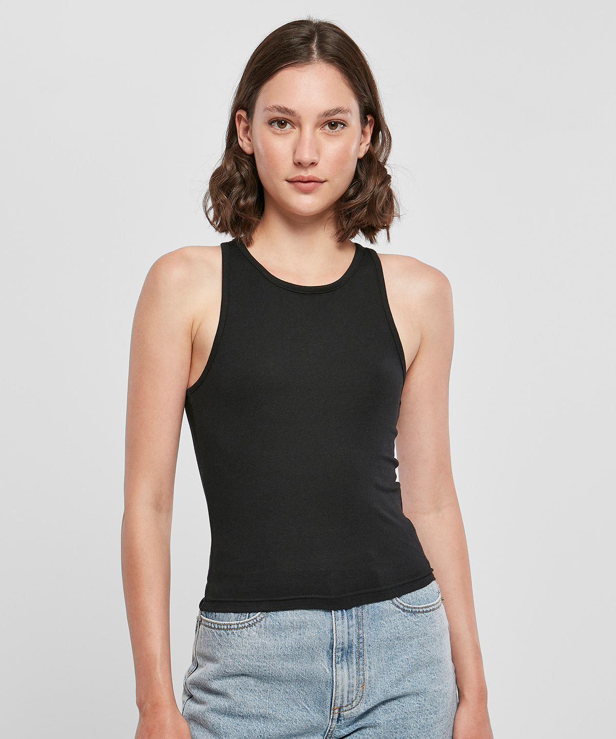 Build Your Brand Women’s racerback top, lifestyle photo