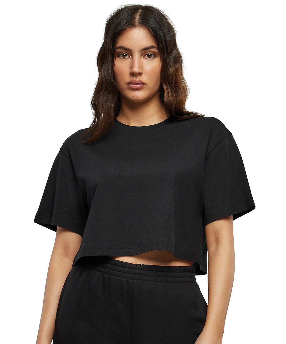 Build Your Brand Women’s short oversized tee, lifestyle photo