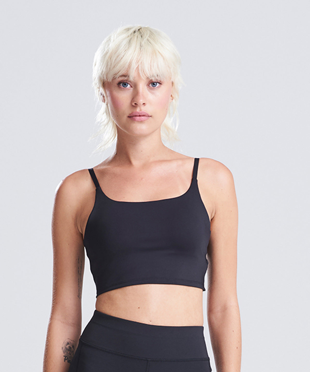 AWDis Just Cool Women’s recycled tech sports bra, lifestyle photo