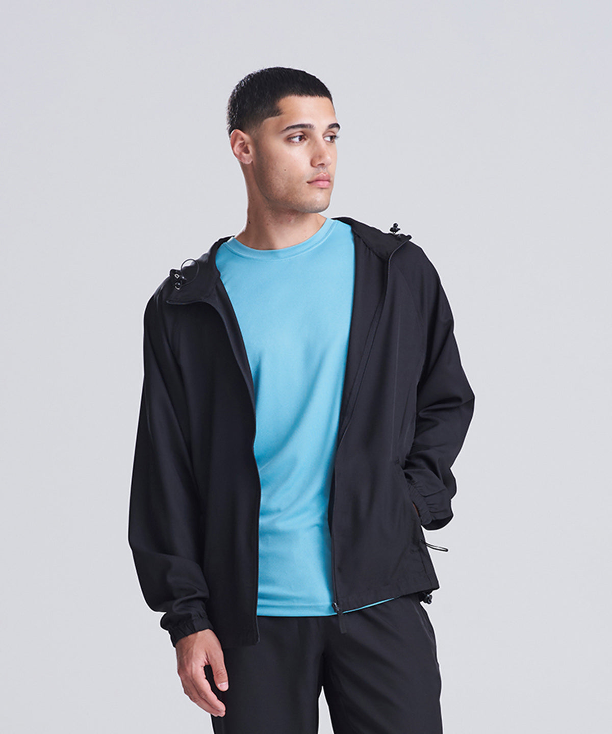 AWDis Just Cool Active track jacket in Jet Black, lifestyle photo