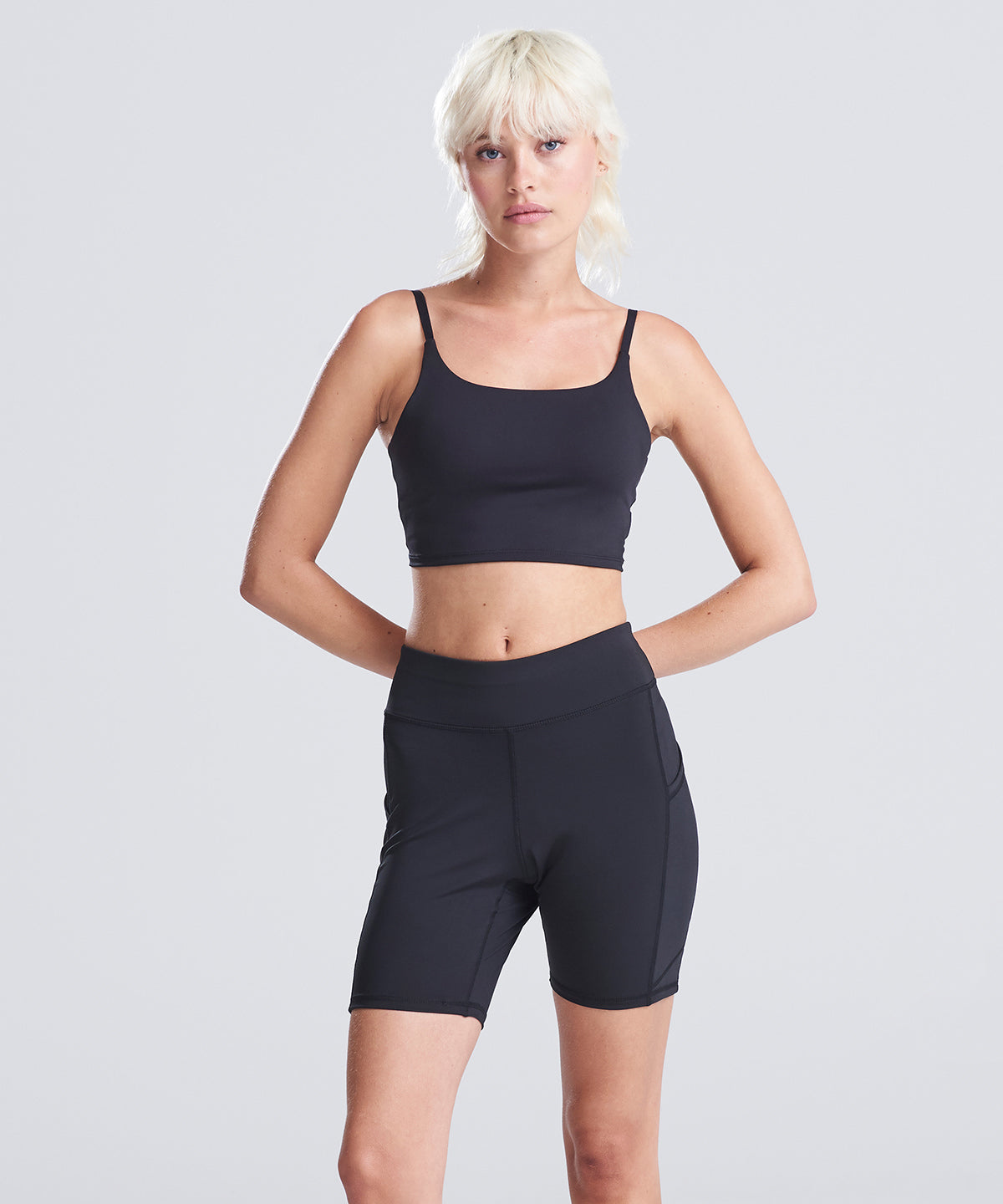 AWDis Just Cool Women’s recycled tech shorts in Jet Black, lifestyle photo