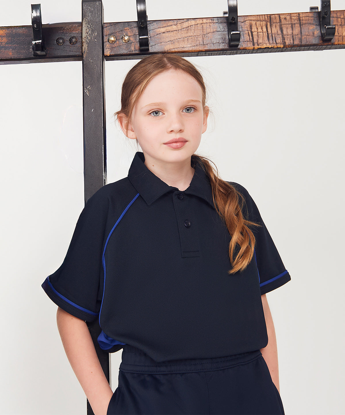 Finden & Hales Kids piped performance polo, lifestyle photo
