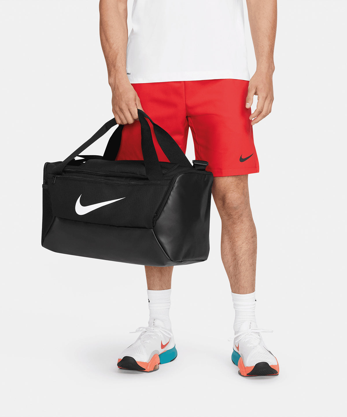 Nike Brasilia small duffle 9.5 in Black/White, lifestyle photo