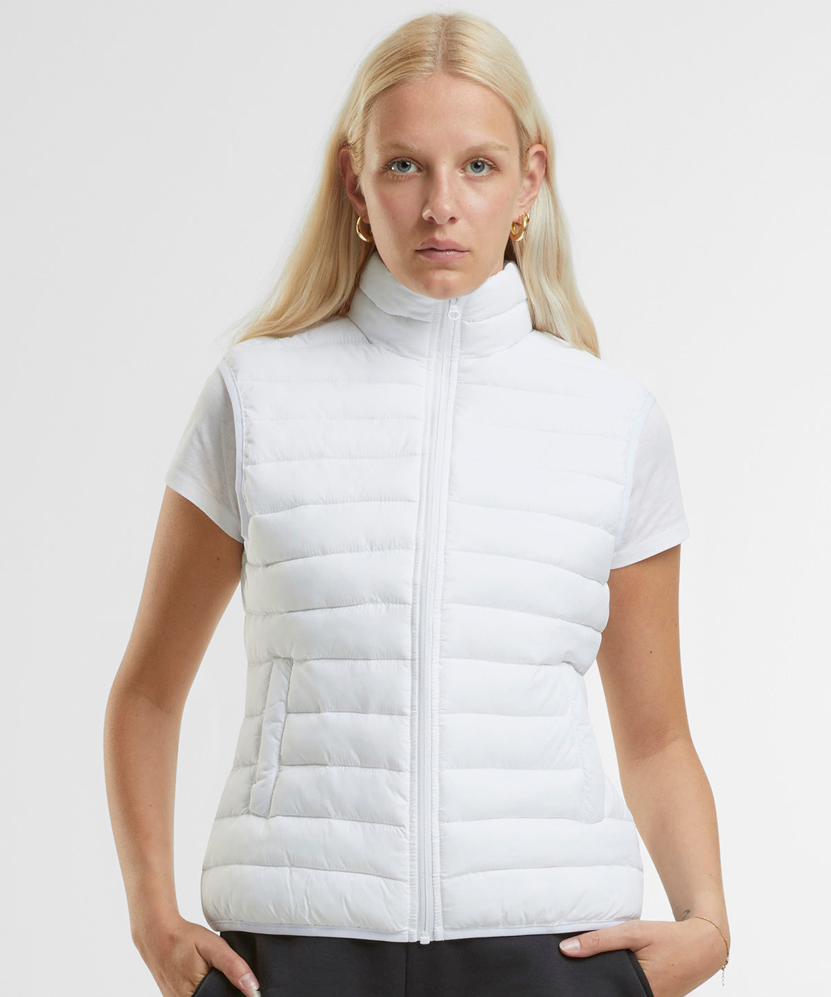 New Morning Studios Women’s light puffer vest, lifestyle photo