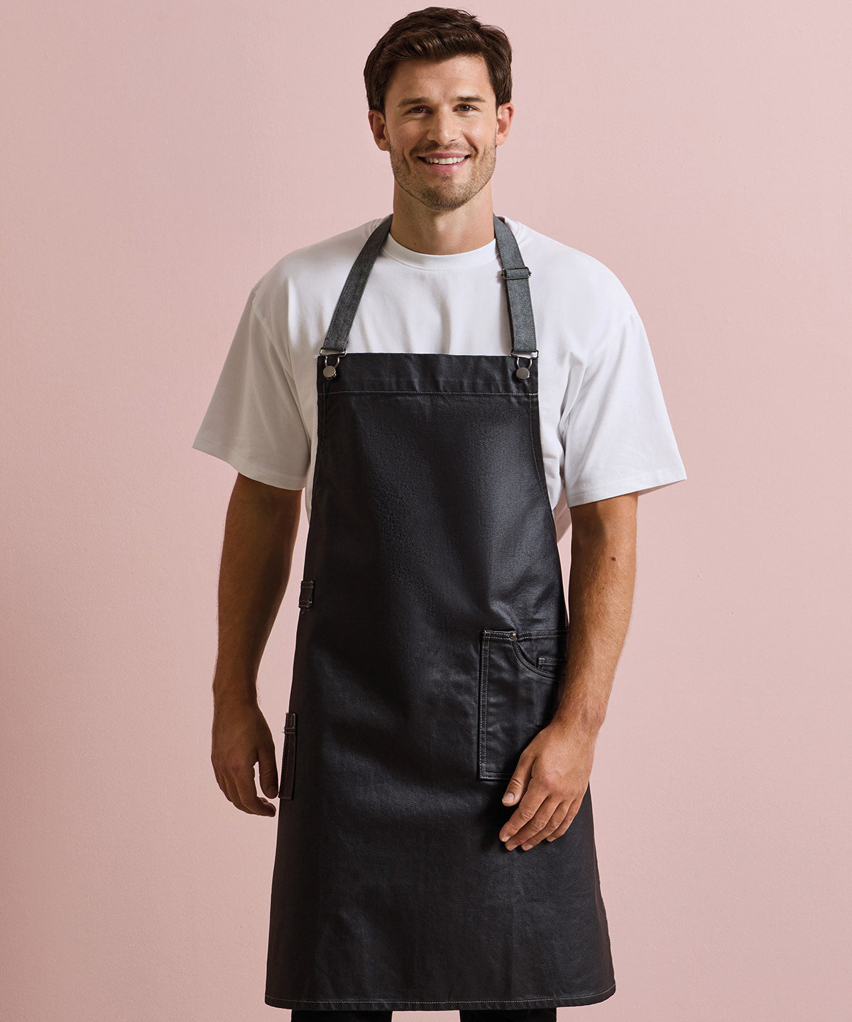 Premier District waxed-look denim bib apron, lifestyle photo