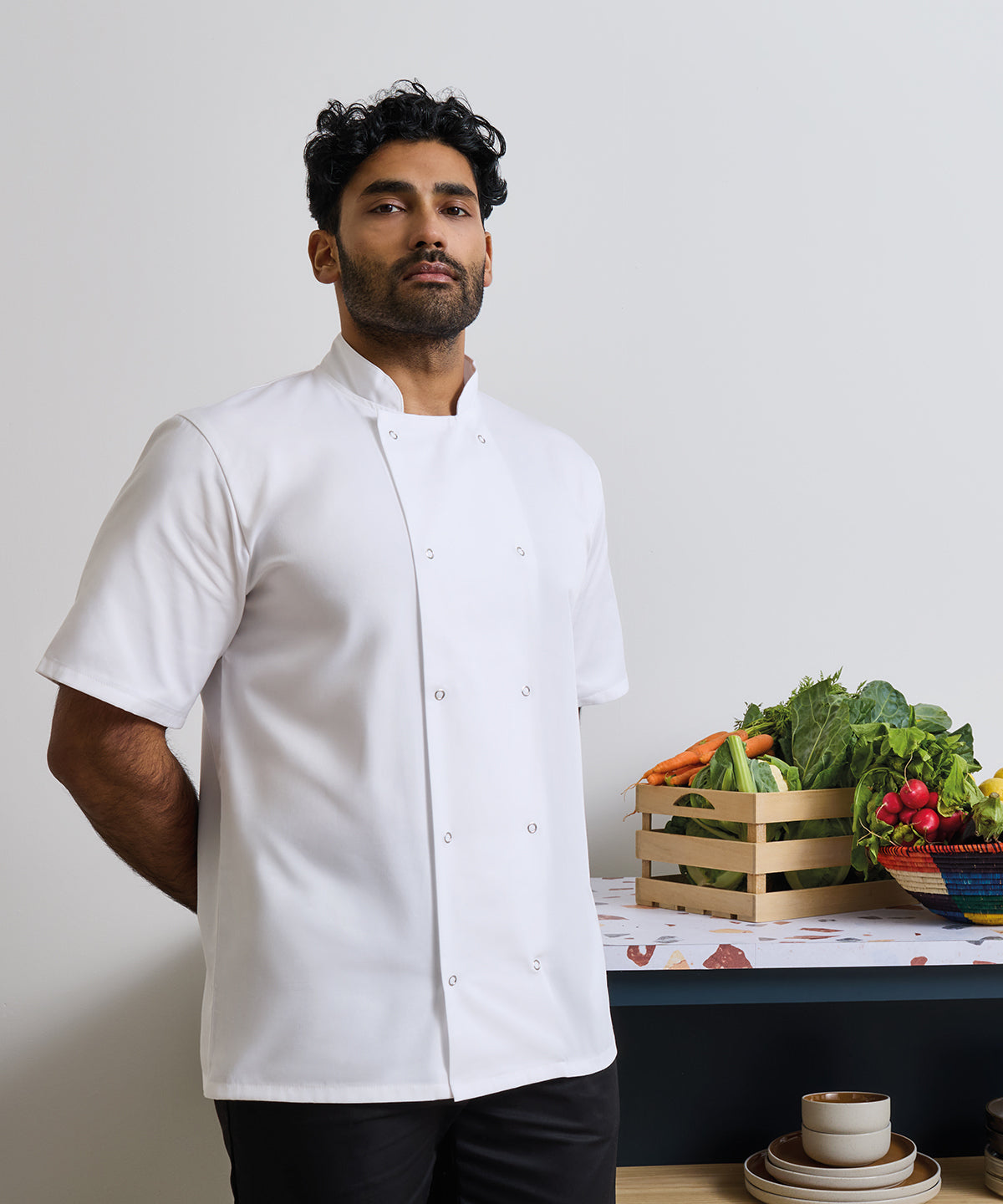 Premier Studded front short sleeve chef's jacket, lifestyle photo