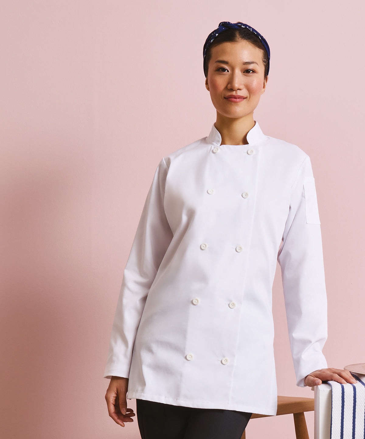 Premier Women's long sleeve chef's jacket in White, lifestyle photo