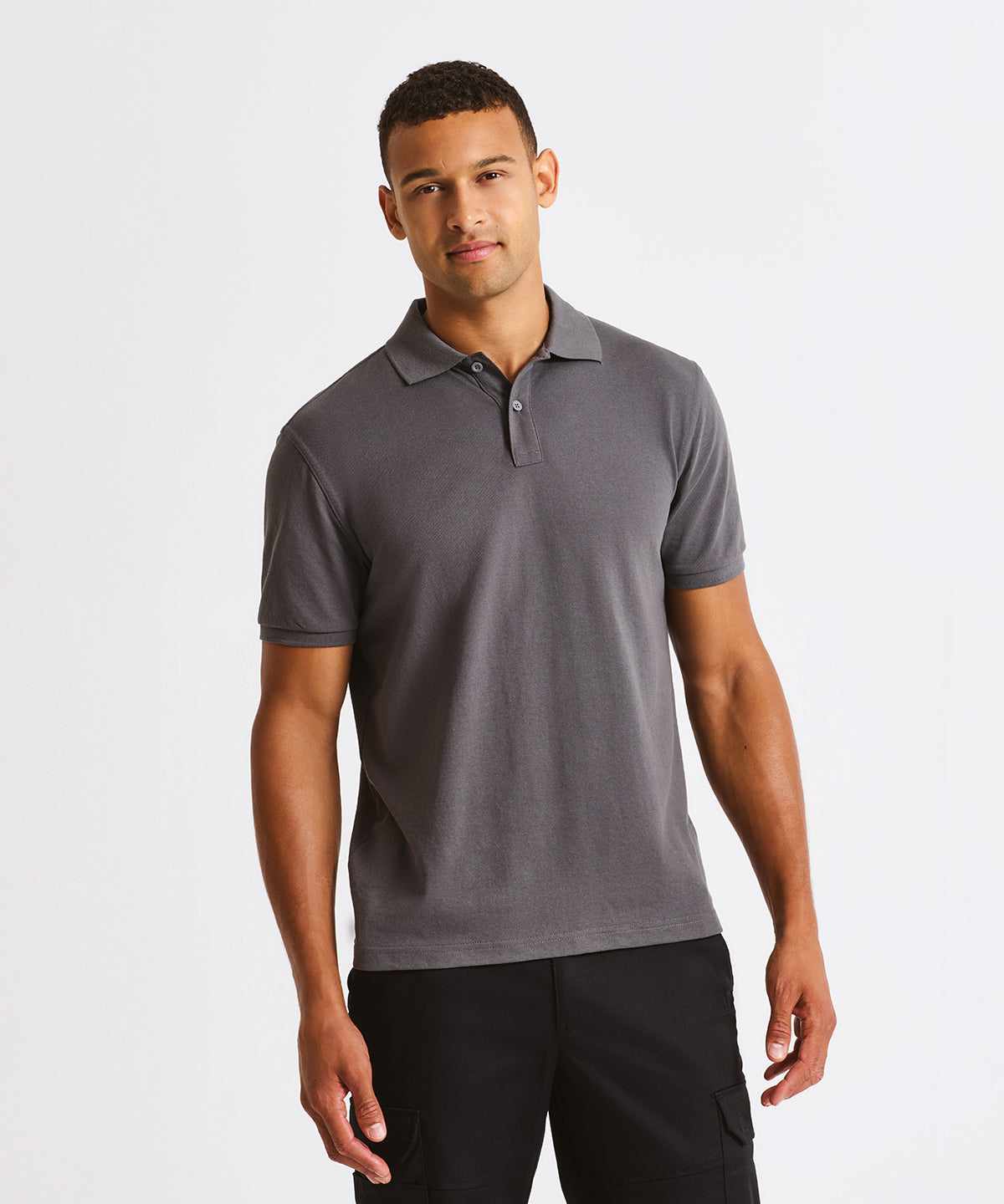 Premier ‘Essential’ unisex short sleeve workwear polo shirt, lifestyle photo