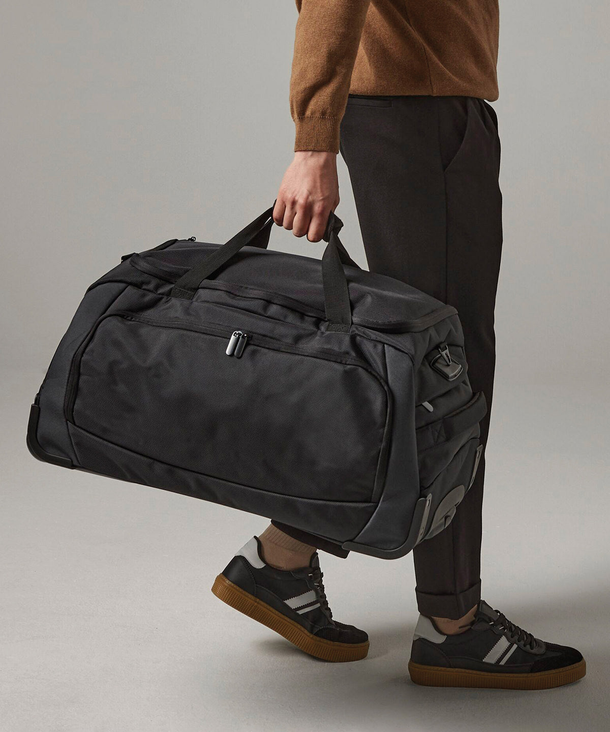 Quadra Tungsten wheelie travel bag in Black/Dark Graphite, lifestyle photo