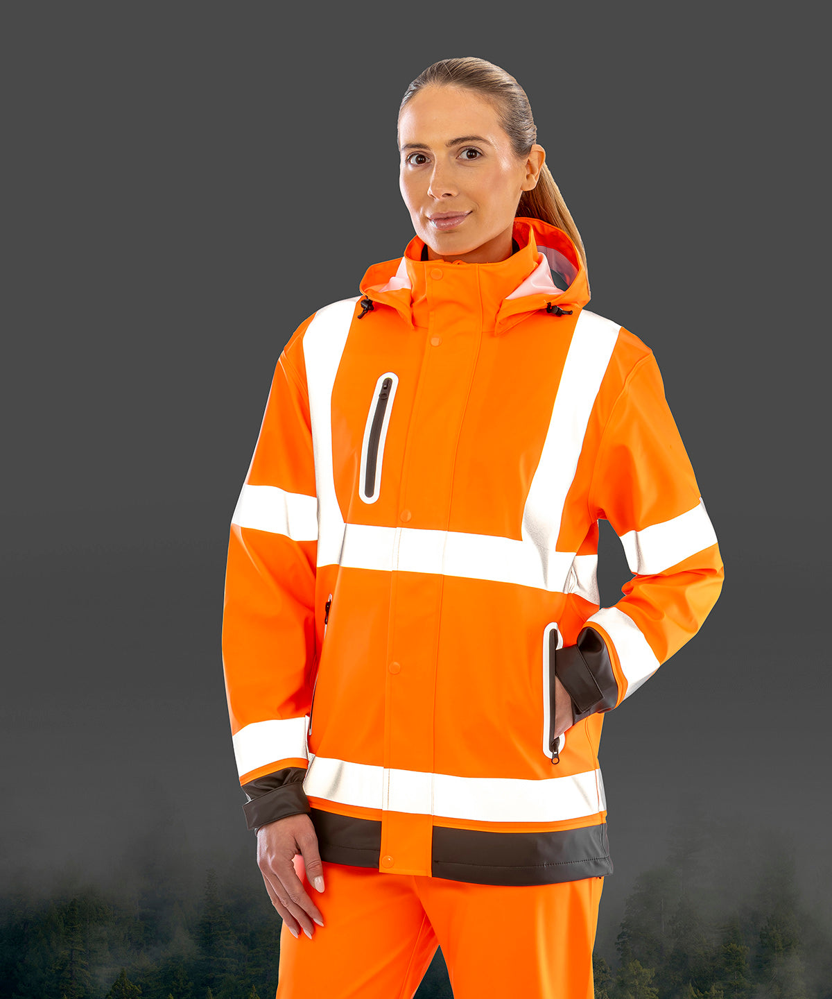 Result Recycled Heavy-duty prism PU safe and dry jacket with recycled backing in Fluorescent Orange/Black, lifestyle photo