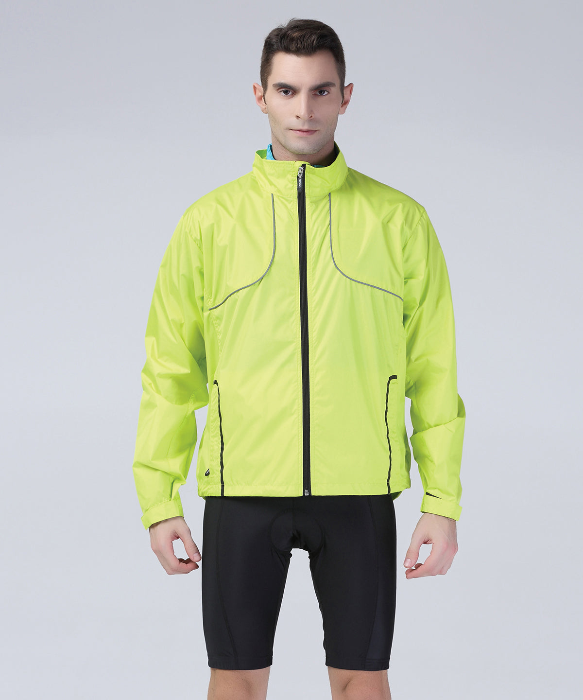 Spiro Crosslite trail and track jacket in Neon Lime, lifestyle photo
