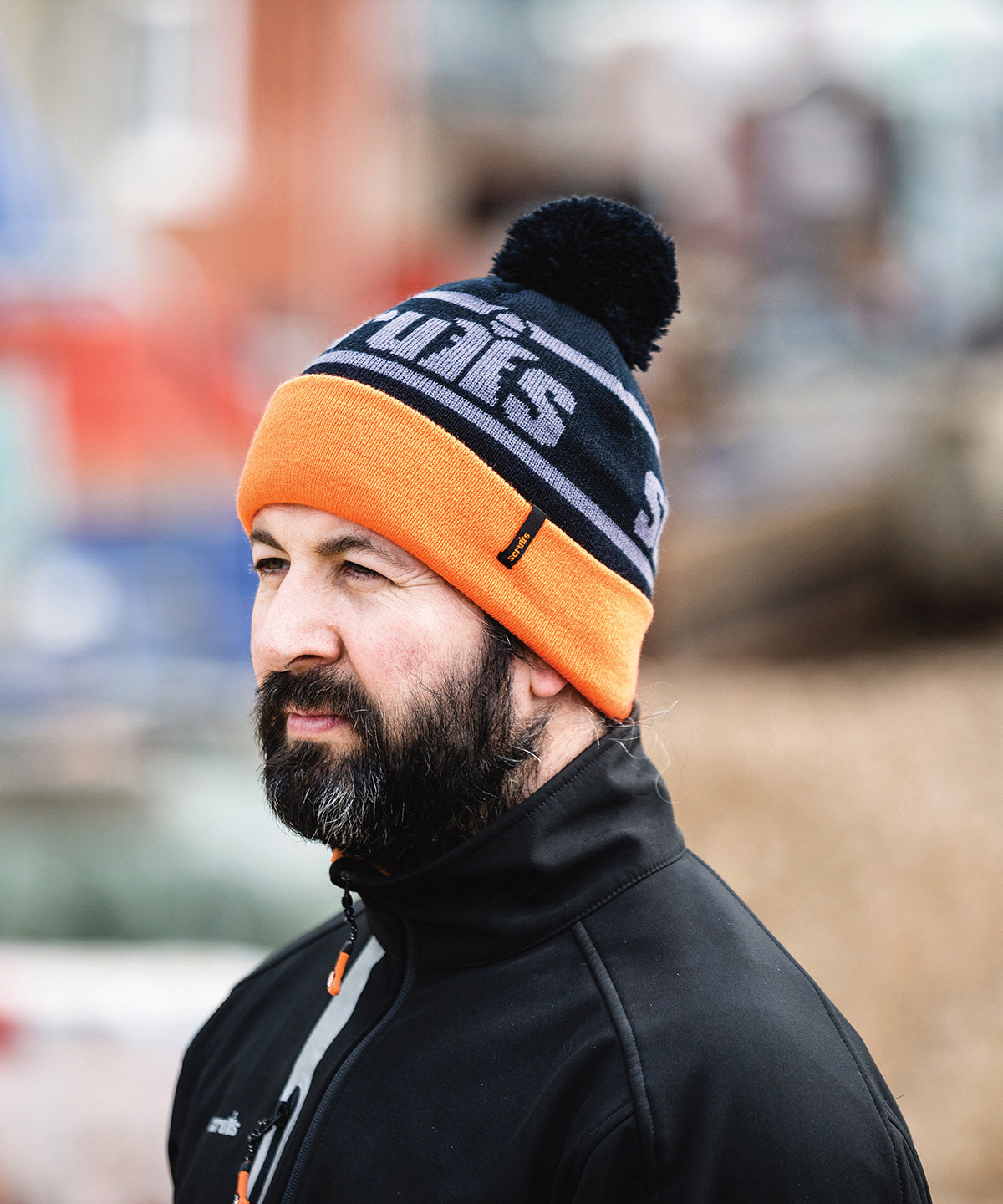 Scruffs Trade bobble hat in Black/Orange, lifestyle photo
