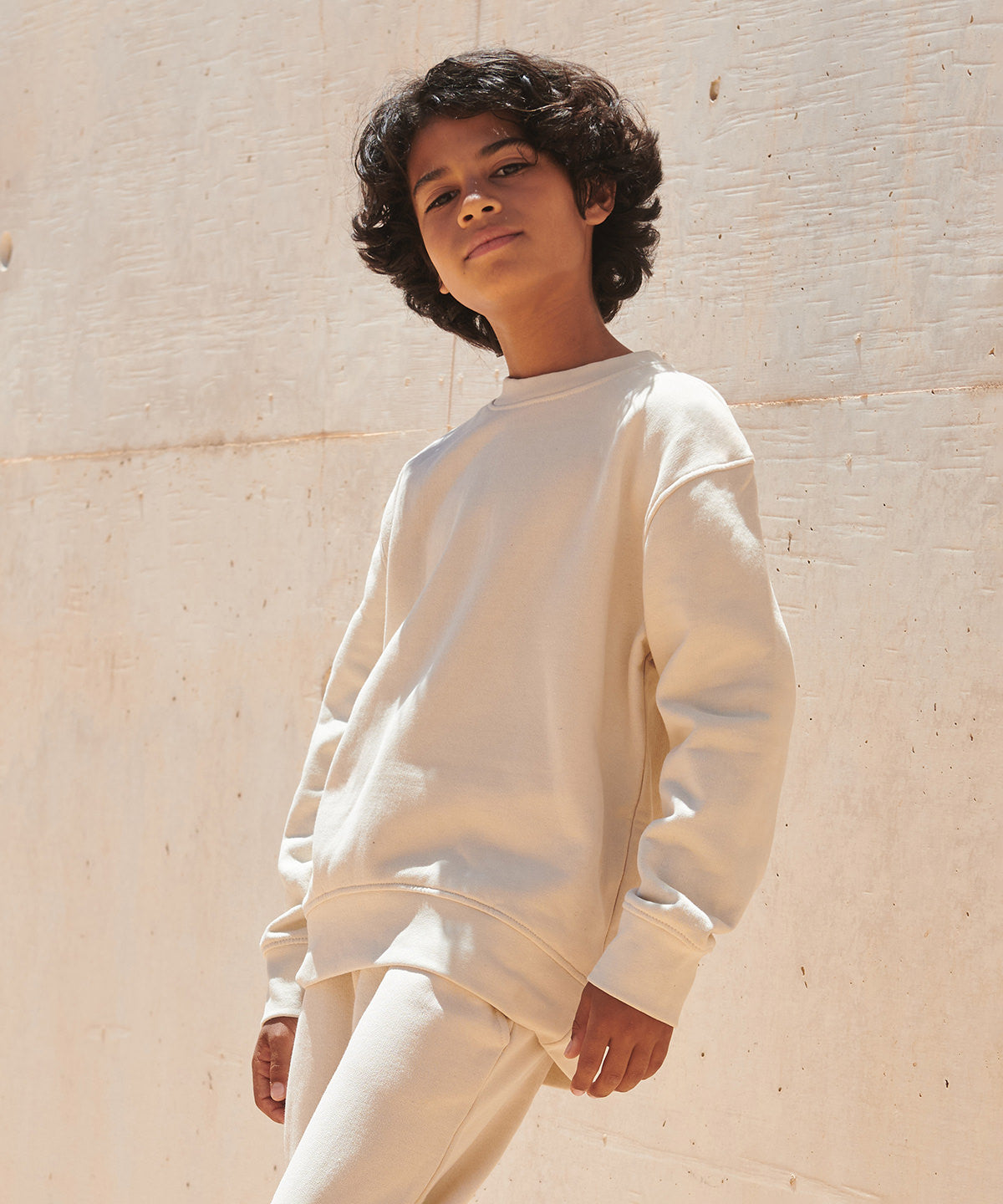 SF Kids sustainable fashion curved hem sweatshirt, lifestyle photo