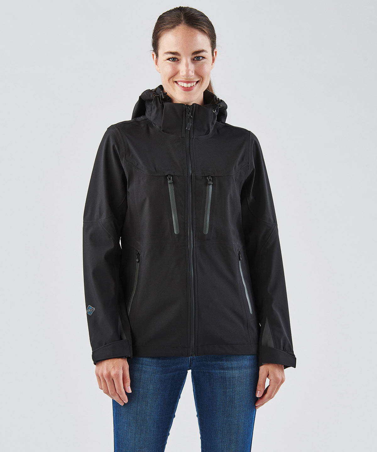 Stormtech Women's Patrol technical softshell jacket in Black/Carbon, lifestyle photo