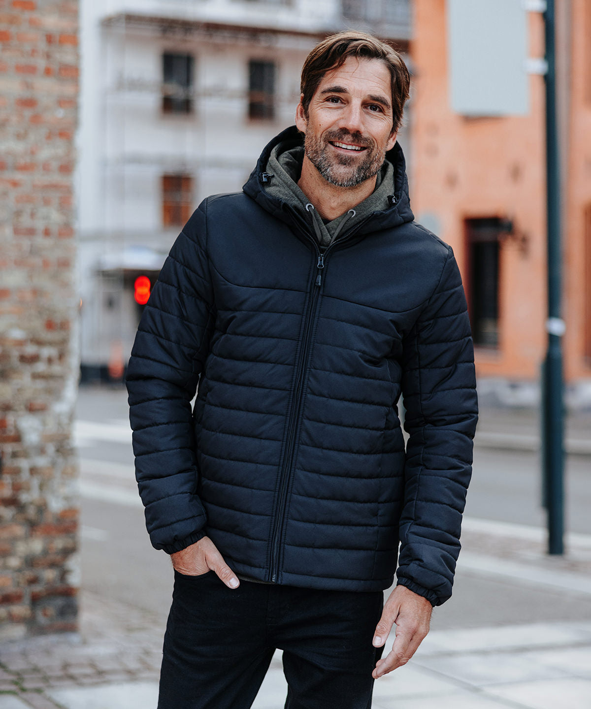 Stormtech Nautilus quilted hooded jacket, lifestyle photo