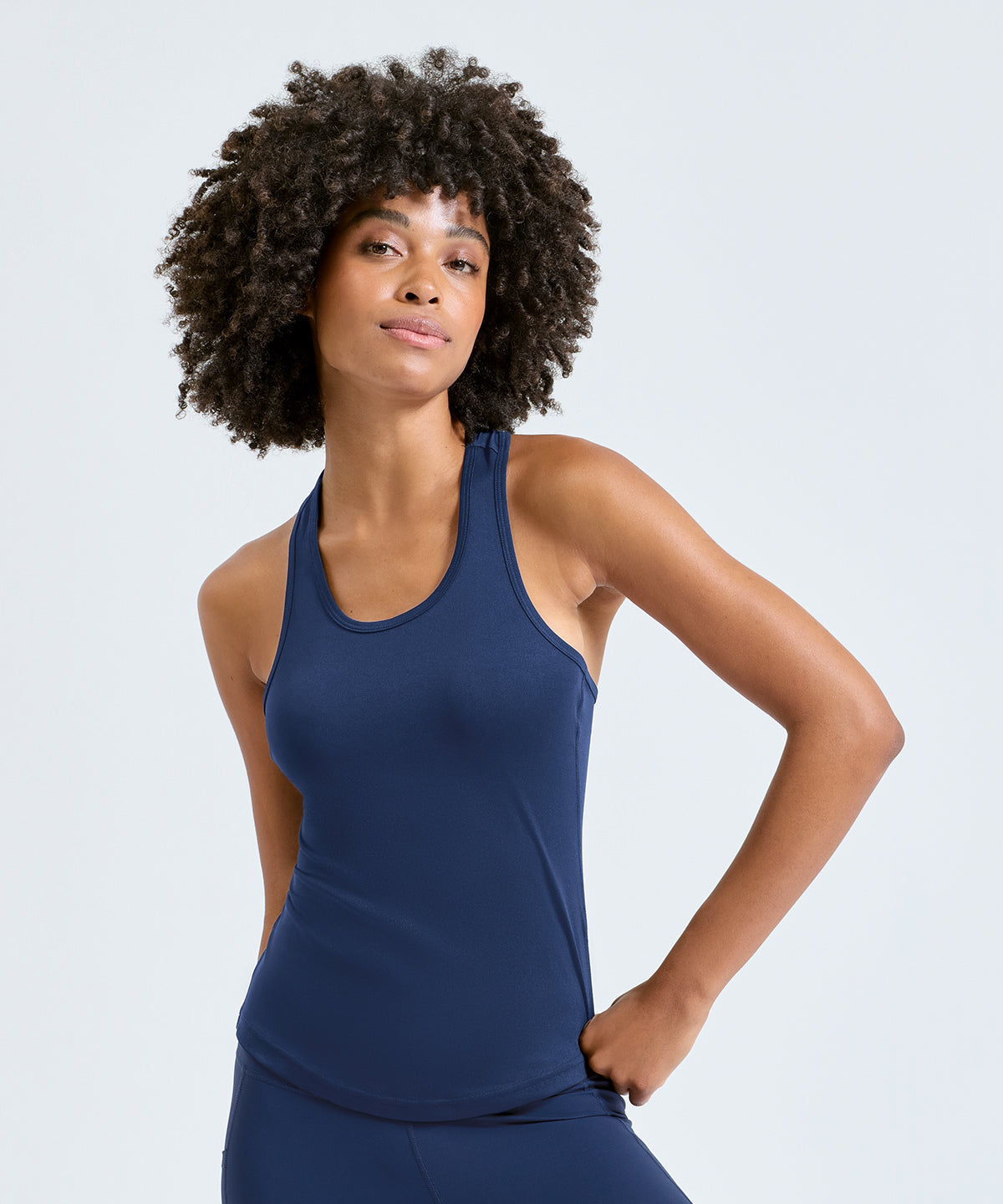TriDri Women's performance strap back vest, lifestyle photo