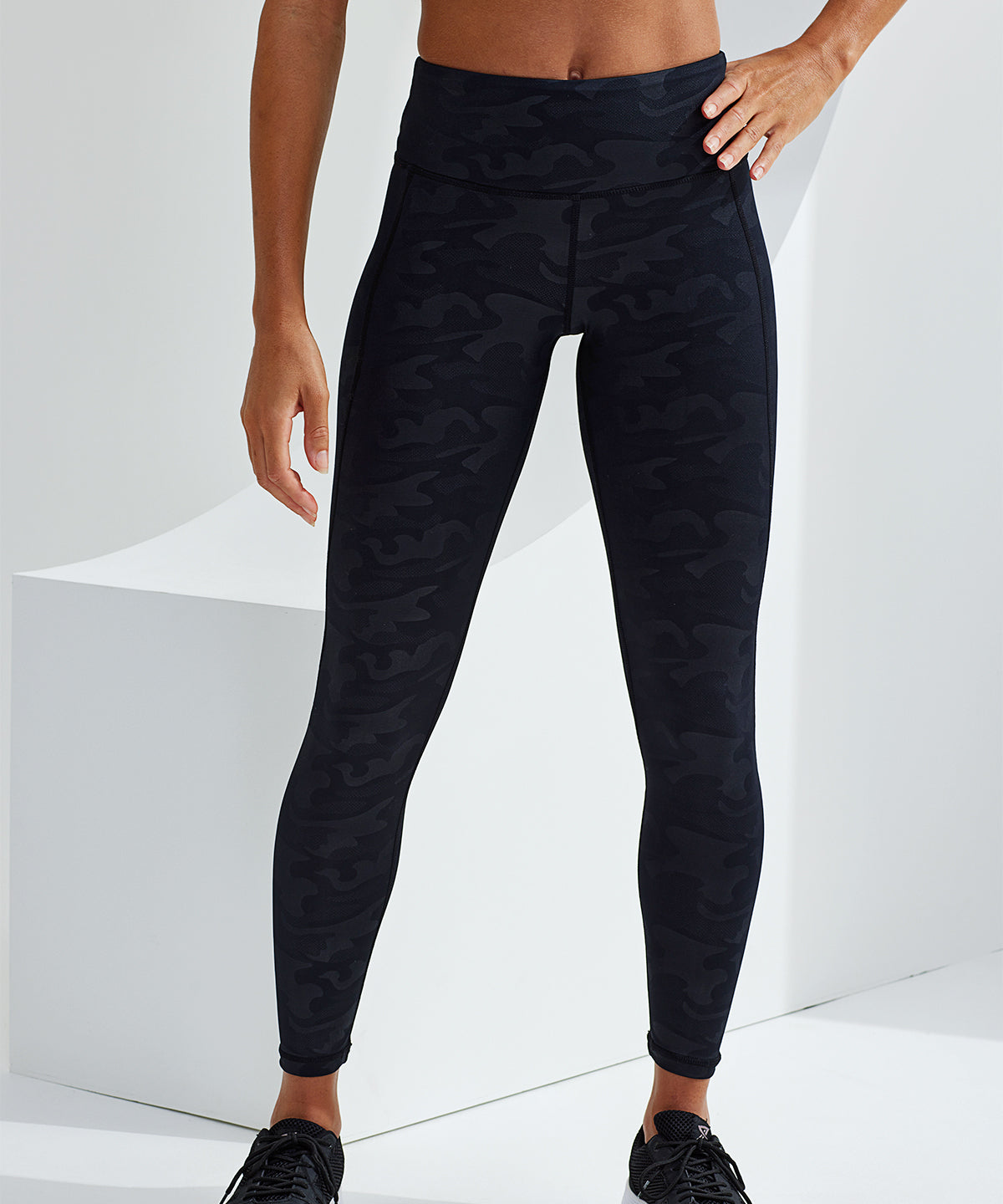 TriDri Women's performance camo leggings full-length in Black Camo, lifestyle photo