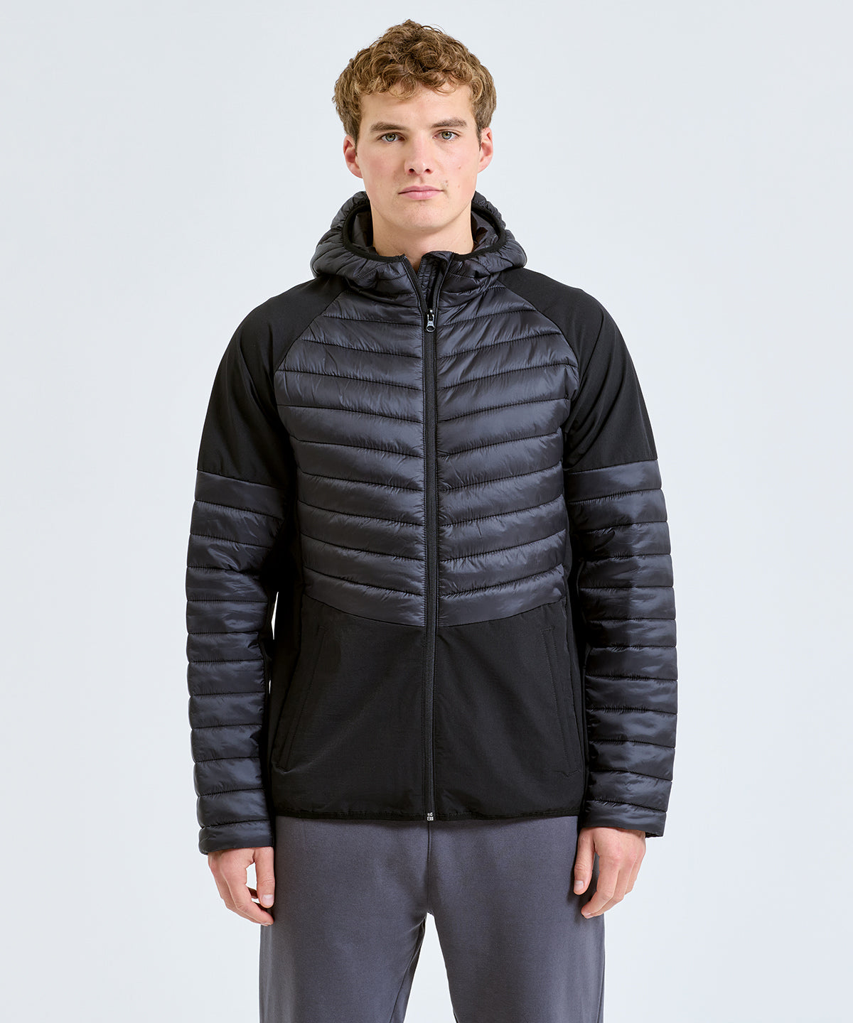 TriDri Men's insulated hybrid jacket in Black, lifestyle photo