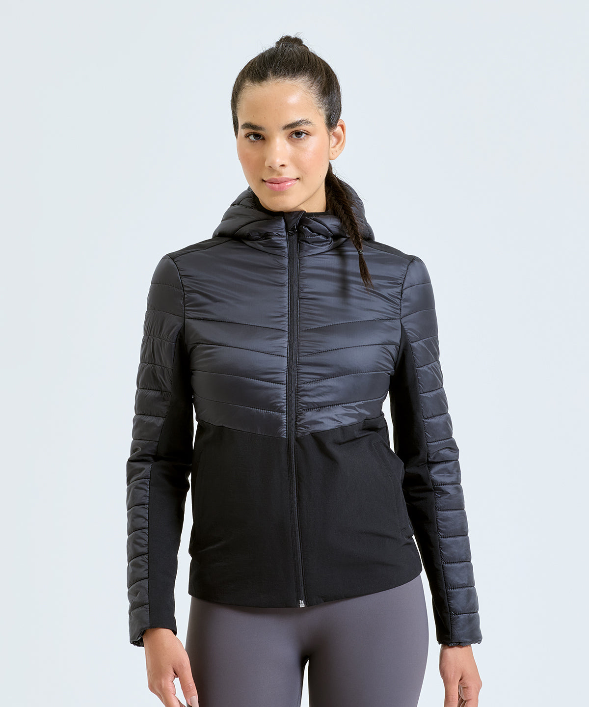 TriDri Women's insulated hybrid jacket in Black, lifestyle photo