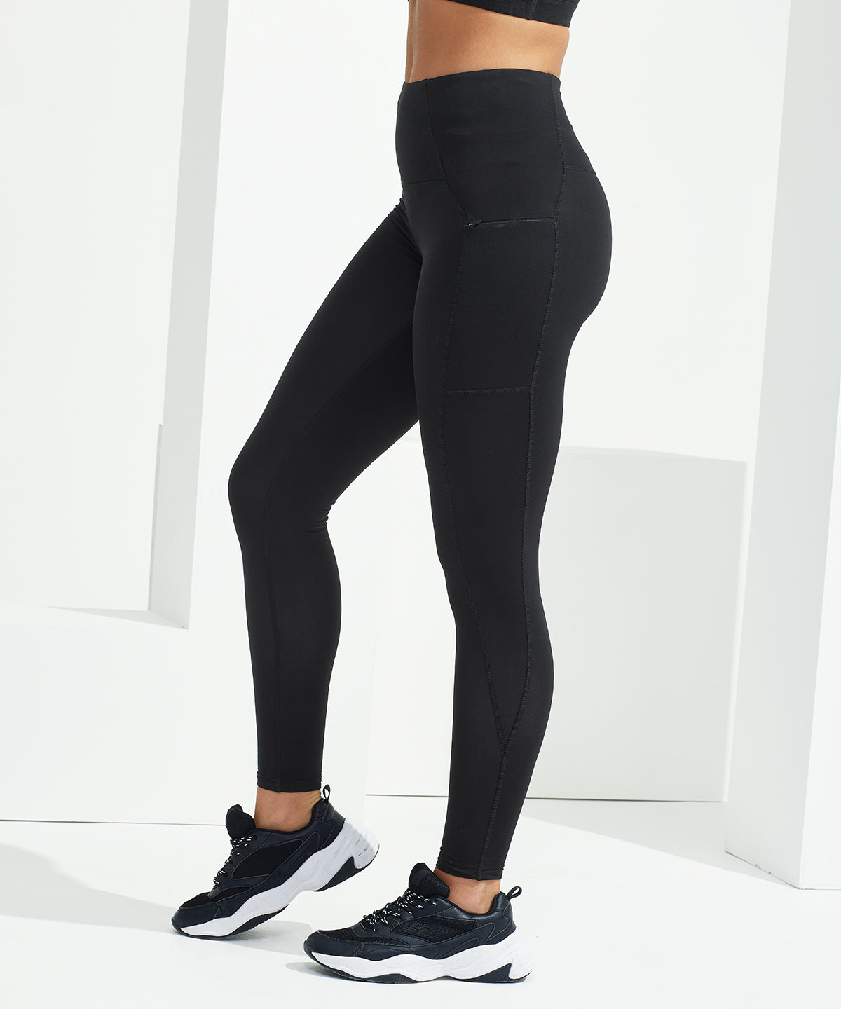 TriDri Women's recycled elements outdoor leggings in Black, lifestyle photo