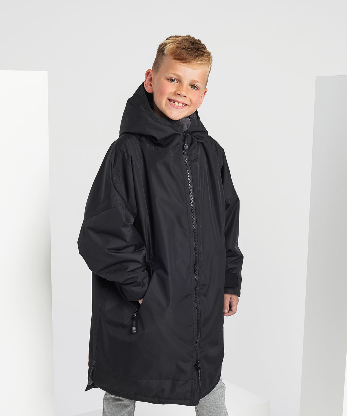 TriDri Kids Recycled all-seasons waterproof changing robe, lifestyle photo