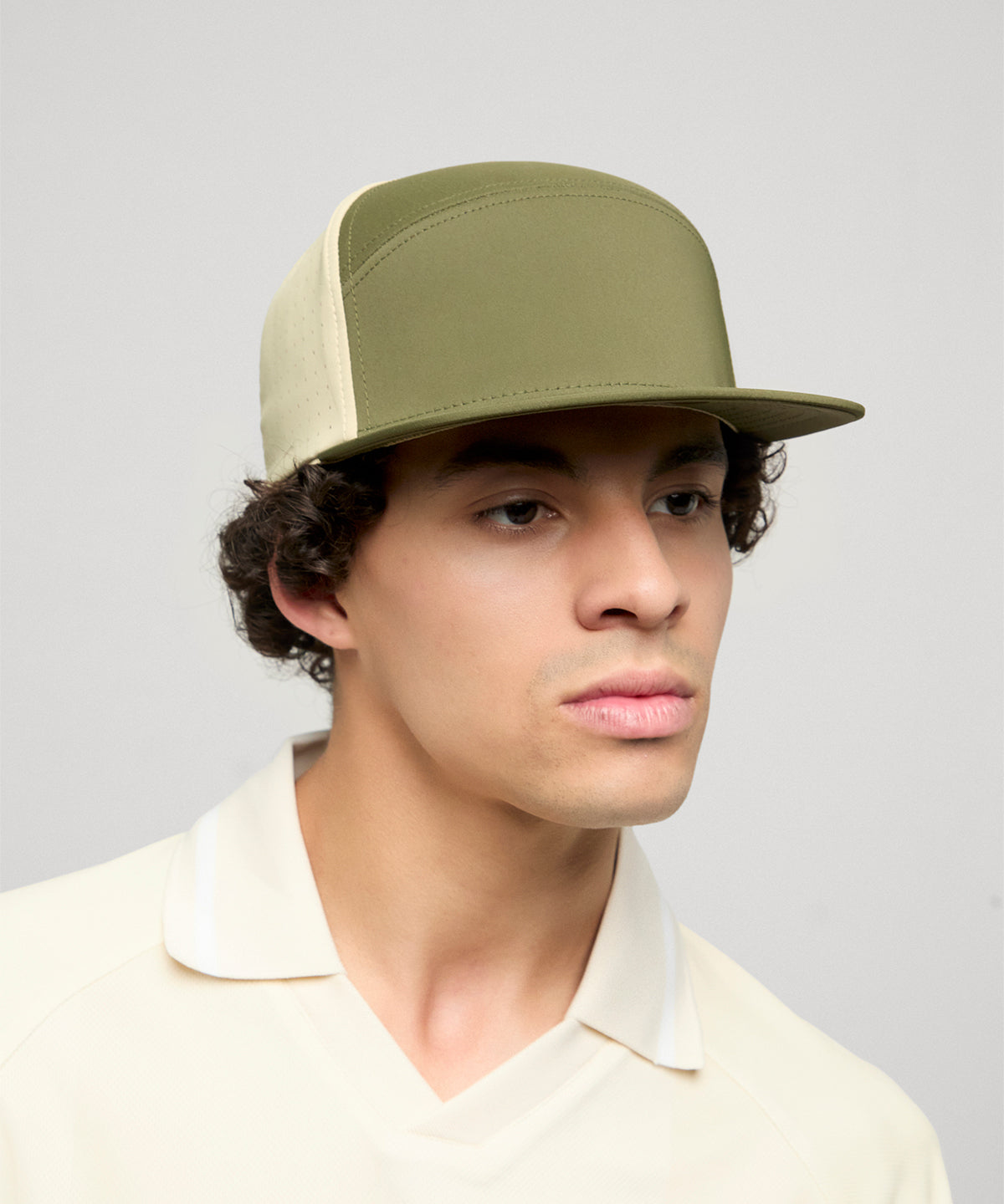 Flexfit by Yupoong Flexfit 110 arch cap in Buck/Rdyl, lifestyle photo