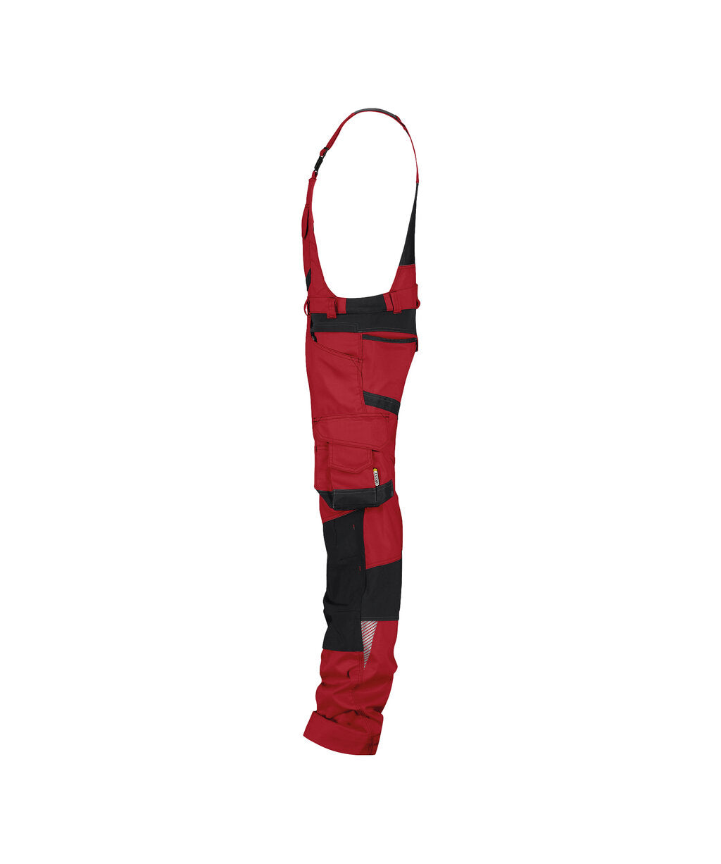 DASSY Tronix Brace overall with stretch and knee pockets in Red/Black, side view