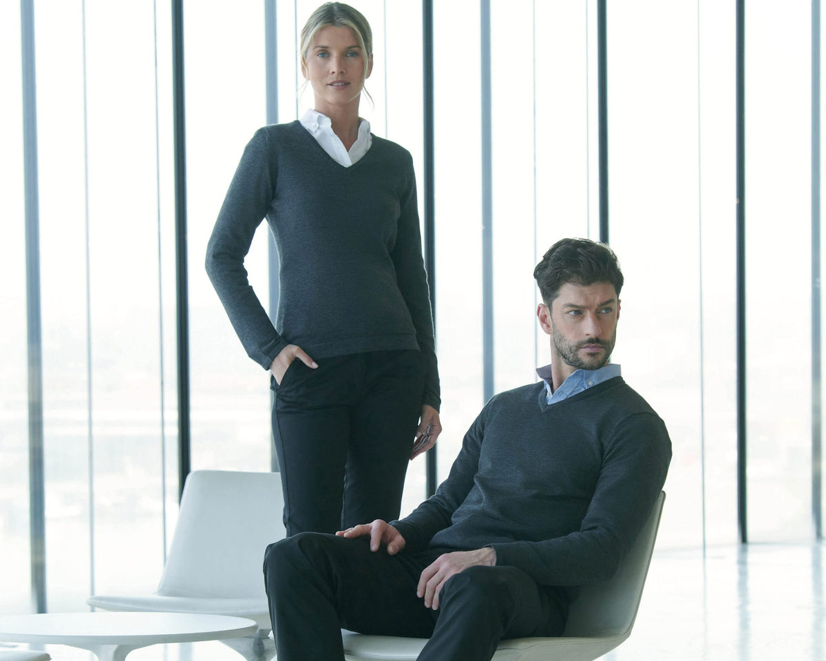 Two office colleagues in Henbury knitwear and shirts