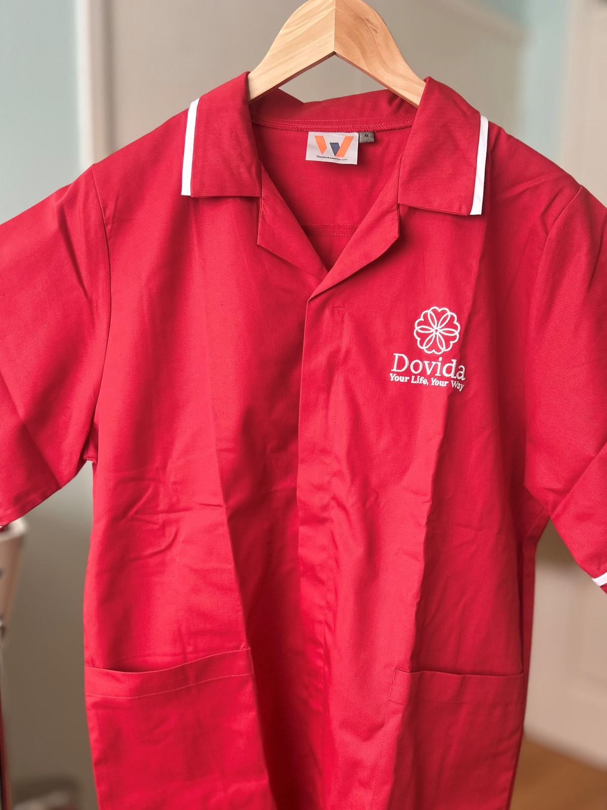Behrens Male tunic with Dovida logo, main product image